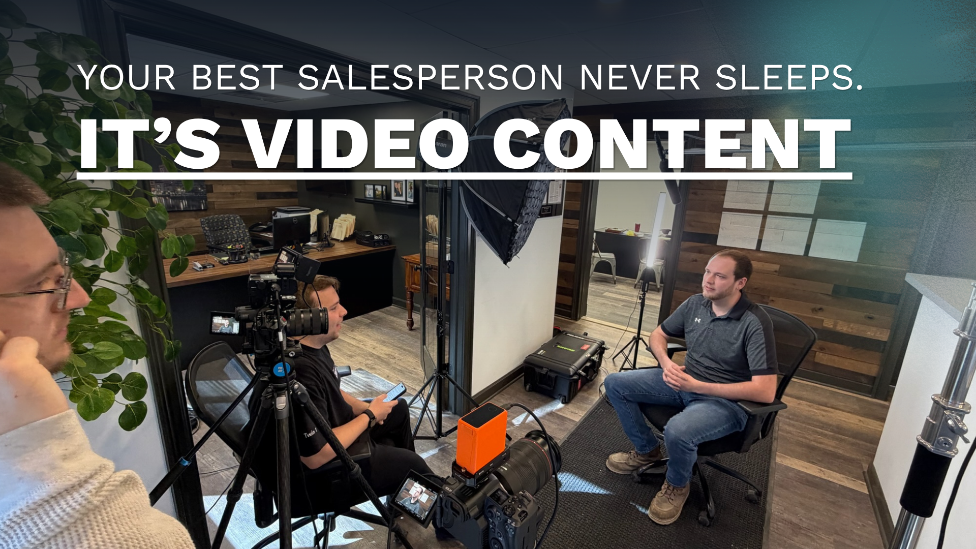 A Double Take Video camera operator filming a man for an interview